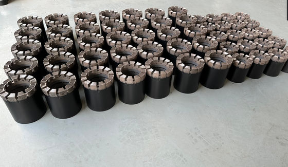 Impregnated Diamond Core Bit Featuring Synthetic Diamonds Embedded in Metal Alloy Matrix for Durable and Rock Cutting Applications